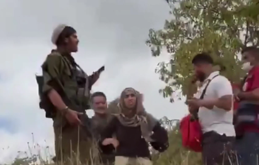 Thumbnail preview image for the video titled: Israeli settlers and soldiers harassing the Palestinians in Idhna for the first day of the olive harvest