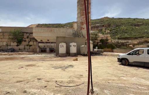 Thumbnail preview image for the video titled: Armed settlers invade a Palestinian concrete firm in Taybeh on a daily basis