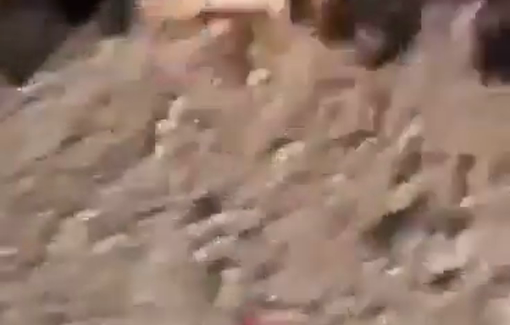 Thumbnail preview image for the video titled: A Palestinian man's corpse being run over repeatedly by Israeli in October 2023 in the Gaza Envelope
