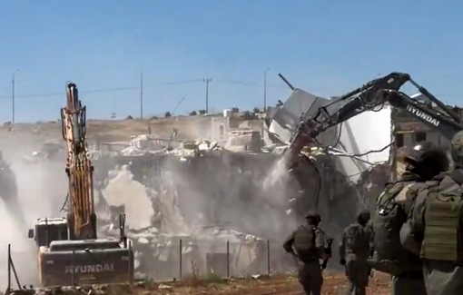 Thumbnail preview image for the video titled: Three Israeli excavators demolished a home and made an entire family homeless in Al-Deirat (Masafer)