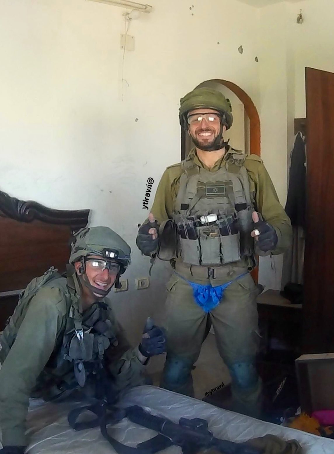 Thumbnail preview image for the video titled: Israeli soldiers from the 94 battalion wearing underwear belonging to Palestinian women