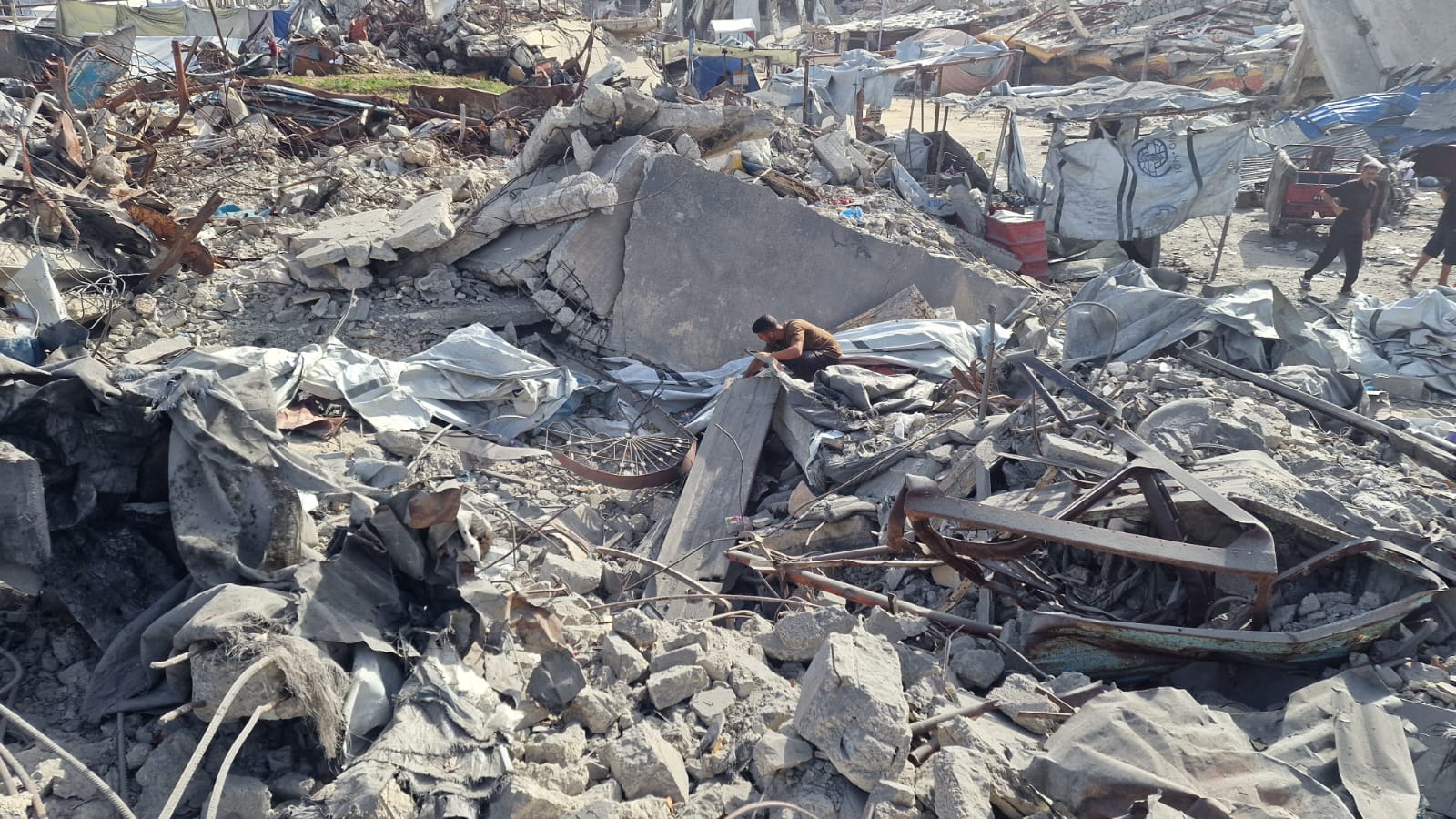 Thumbnail preview image for the video titled: Residential block destroyed by Israeli bombing of Al-Faluja area