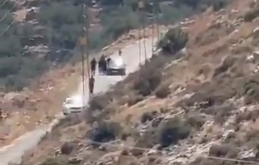 Thumbnail preview image for the video titled: in Deir Abu Mashal, settlers pushed a Palestinian vehicle down a slope