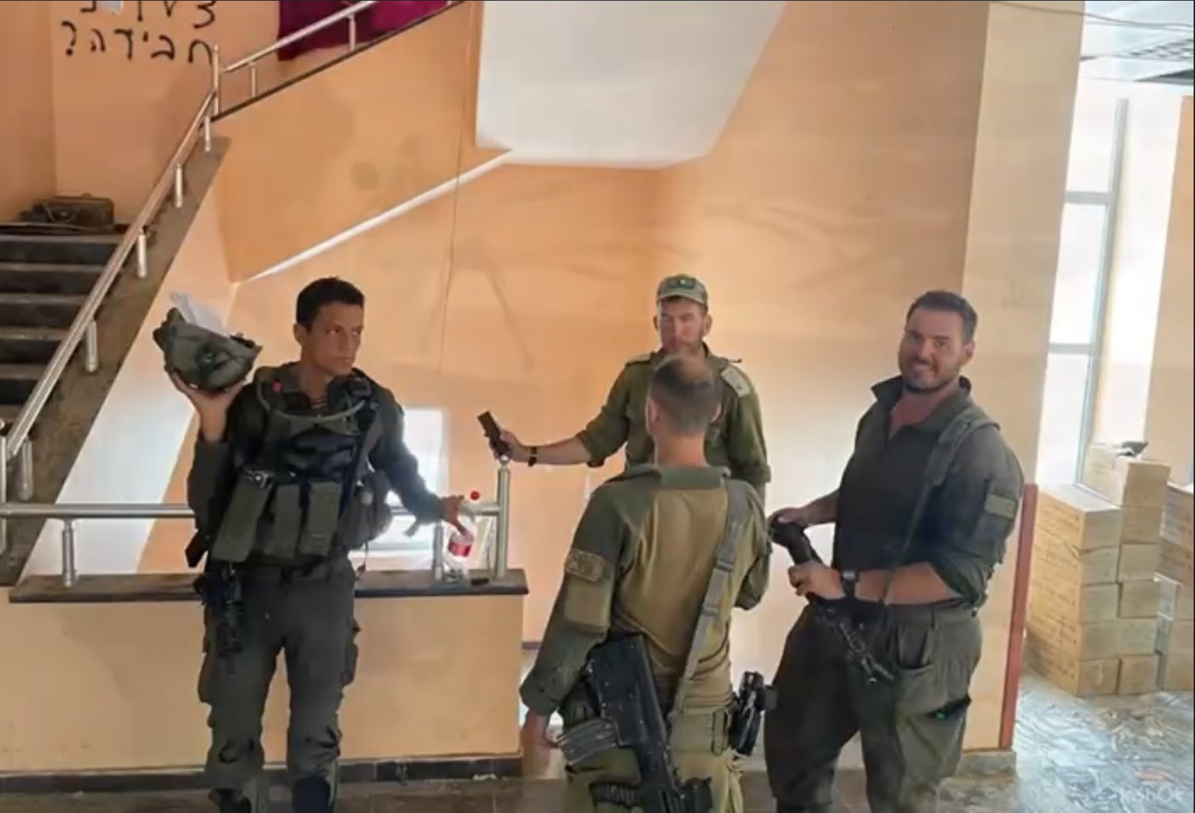 Thumbnail preview image for the video titled: IDF soldiers use Gaza's only cancer hospital as military base