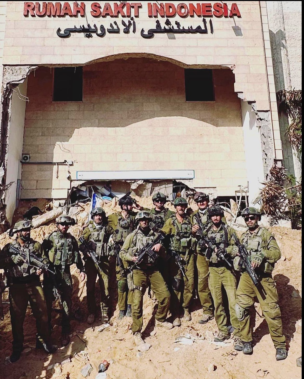 Thumbnail preview image for the video titled: IDF squad's group photo while occupying the Indonesian Hospital in North Gaza