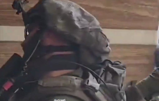 Thumbnail preview image for the video titled: Israeli battalion fools around riding wheelchairs after expelling and occupying rehabilitation hospital in Gaza
