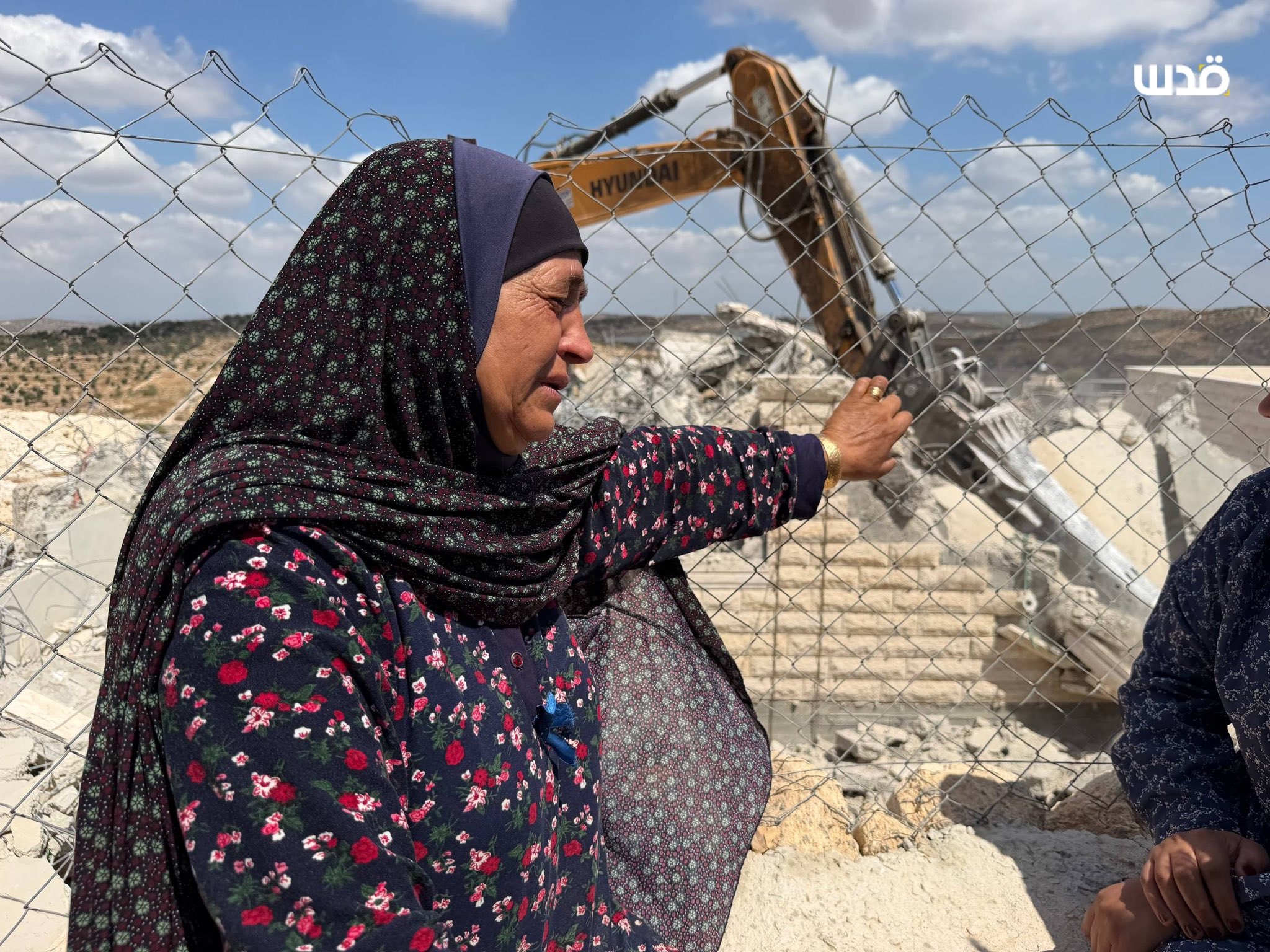 Thumbnail preview image for the video titled: A new Palestinian family was left homeless after Israeli bulldozers tore down their home in Idhna