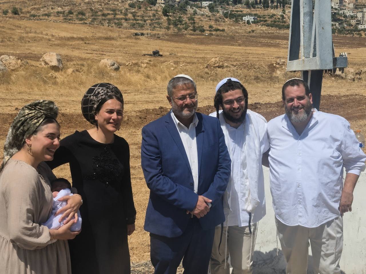 Thumbnail preview image for the video titled: Israeli Security minister Ben-Gvir storms the entrance of Al-Mughayyir village, and takes photos with Israeli settlers
