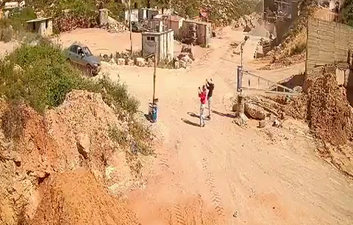 Thumbnail preview image for the video titled: Protective presence try to prevent Israeli settlers to invade the Concrete factory of Taybeh