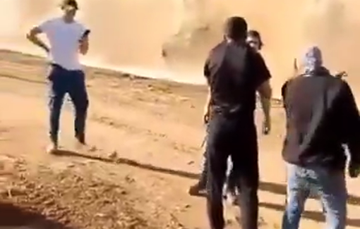 Thumbnail preview image for the video titled: Armed Israeli Settlers Attack Palestinian Farmers in Tayasir