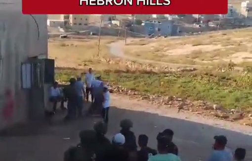 Thumbnail preview image for the video titled: For six hours, dozens of settlers and soldiers raided the Wadi Rakhim area and the outskirts of the town of Samoa (as Samu)