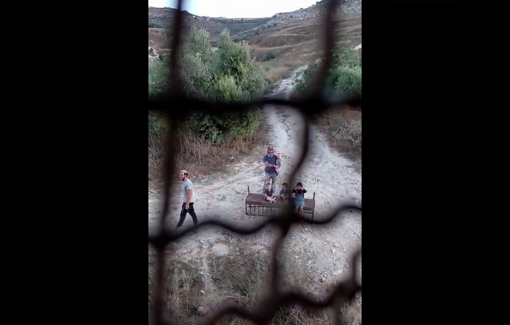 Thumbnail preview image for the video titled: Two Israeli settlers brought their children—including infants—with them to harass a Palestinian family in the village of Burin