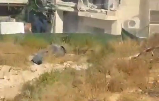 Thumbnail preview image for the video titled: Israeli soldiers dance during the demolition of inhabited Palestinian homes in the village of Nahhalin