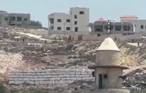 Thumbnail preview image for the video titled: Israeli settler attacked the homes of Palestinians during their rampage on the town of Tell