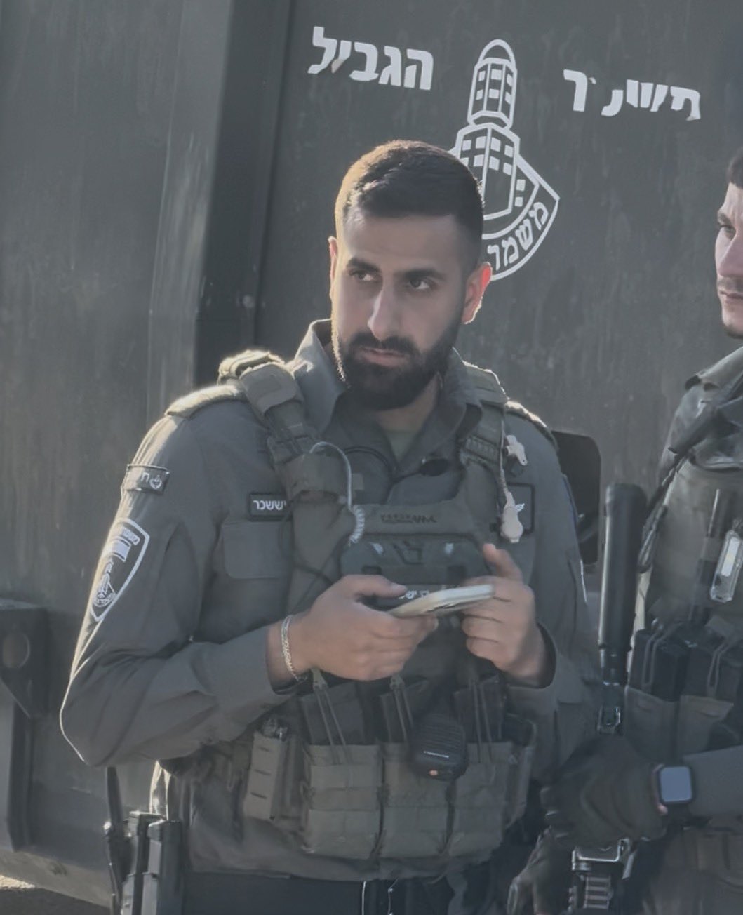 Thumbnail preview image for the video titled: Raz Issashar & his Border Police team raided the memorial for Awdah Hathaleen and assaulted MK Ofer Cassif