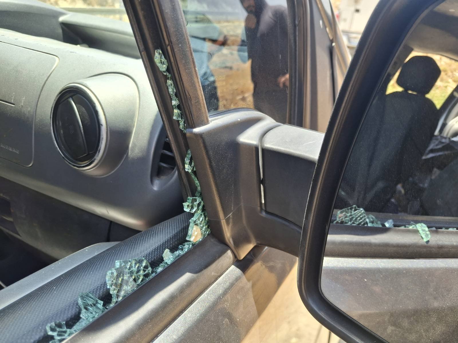 Thumbnail preview image for the video titled: A delivery guy from al Fawar refugee camp was attacked by settlers while driving near the village of Sh'ib al Butum
