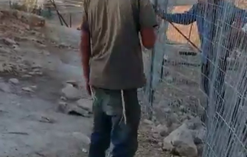 Thumbnail preview image for the video titled: As soon as MK Cassif ended his visit, a settler teenager resumed his attack on the property fence