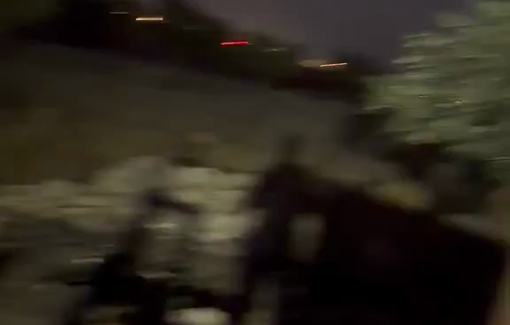 Thumbnail preview image for the video titled: In the middle of the night, a settler guides soldiers inside the Bedouin compound at Taybeh Junction