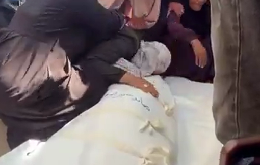 Thumbnail preview image for the video titled: Families mourn relatives killed by Israel in massacre bombing of Gaza Port cafe