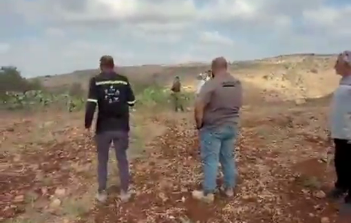 Thumbnail preview image for the video titled: An Israeli soldier shot a Palestinian farmer in the leg to support settler grazing on his land