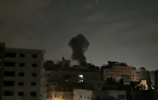 Thumbnail preview image for the video titled: Smoke rises after Israel bombed a residential building in western Gaza City