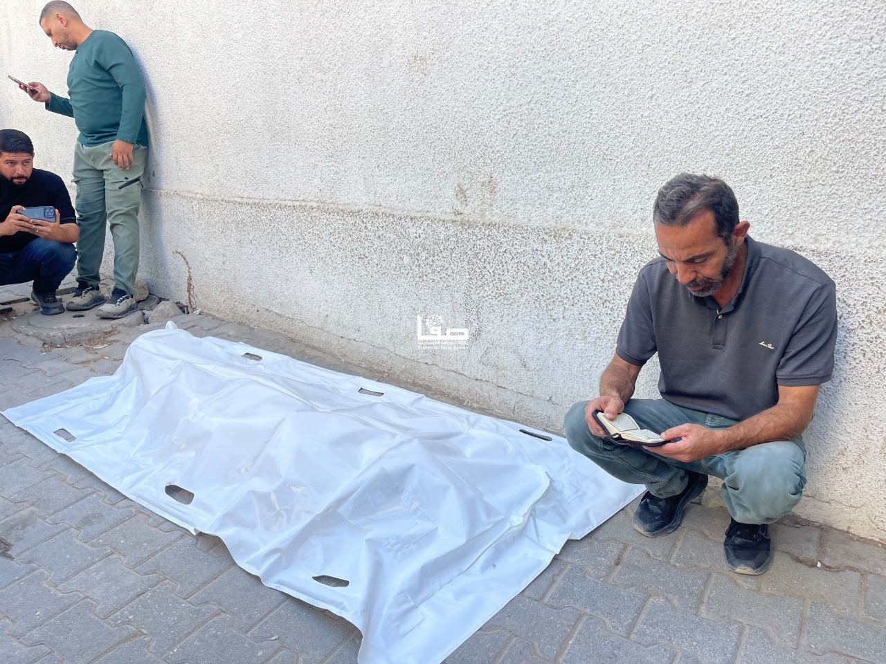 Thumbnail preview image for the video titled: Palestinians mourn relatives killed in their sleep by Israeli bombing of their residence