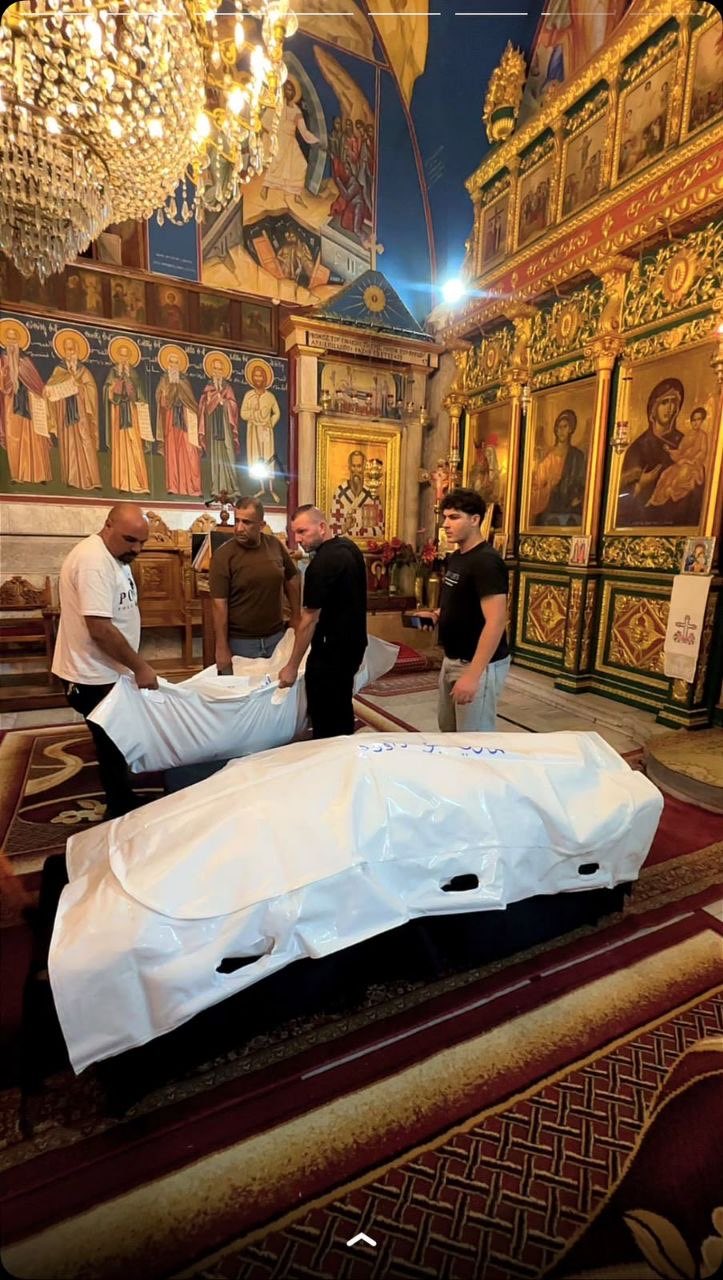 Thumbnail preview image for the video titled: Funeral of Christian mother and daughter killed by Israel's bombing of their apartment in Gaza City