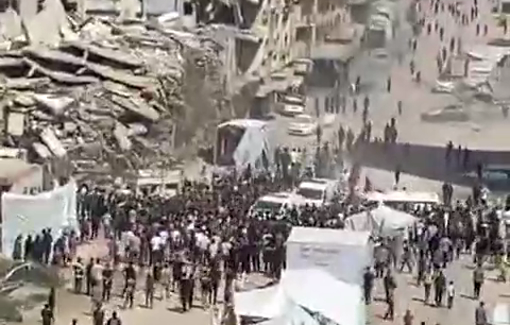 Thumbnail preview image for the video titled: Crowd gathers after an Israeli drone struck a Palestinian in Tal al-Hawa