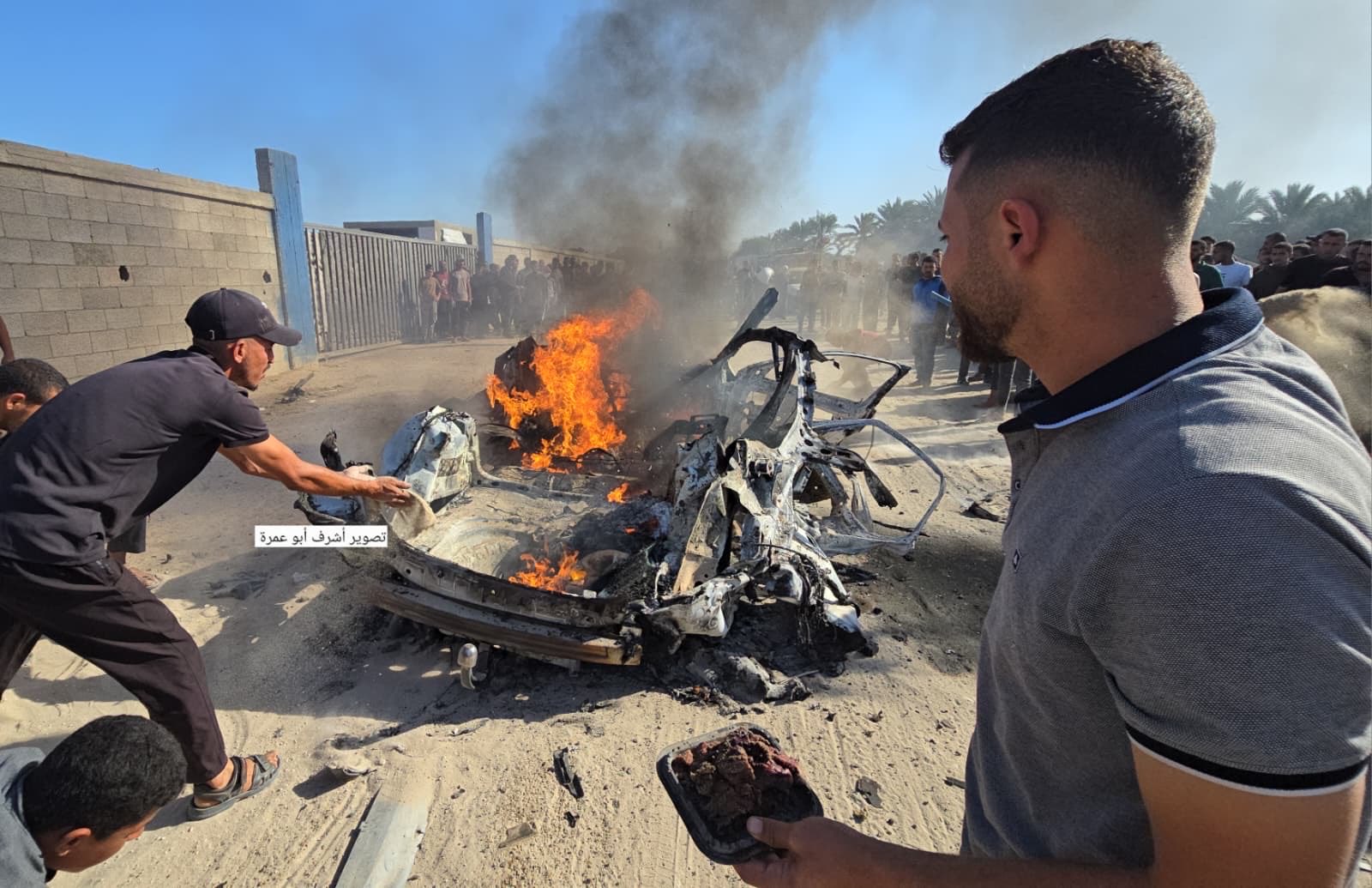 Thumbnail preview image for the video titled: Car of aid coordinator ablaze after deadly Israeli drone strike