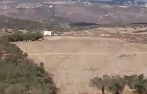 Thumbnail preview image for the video titled: Terror attack by Israeli settler militias under army cover against olive-picking farmers near the village of Ramin