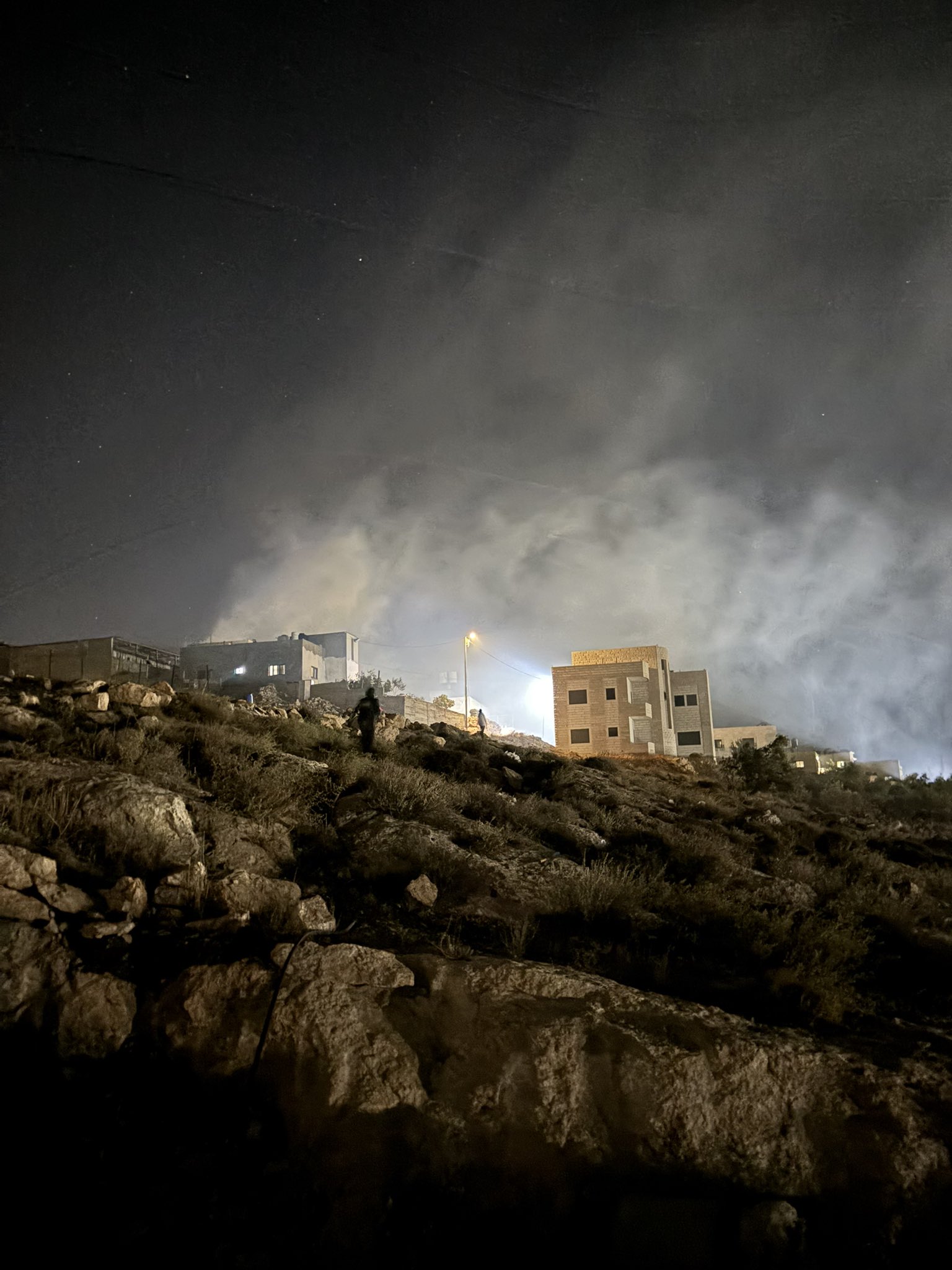 Thumbnail preview image for the video titled: 2 a.m. In Al-Mughayyir, settlers attacked Palestinian homes and set fire to a vehicle belonging to a journalists.