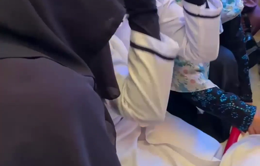 Thumbnail preview image for the video titled: On-duty medical students mourns and prays for her father killed in Israeli airstrike