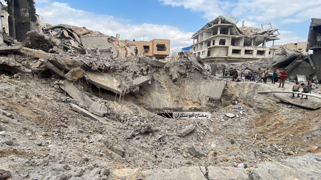 Thumbnail preview image for the video titled: Crater left in the wake of Israel's bombing of house in the Sabra neighborhood