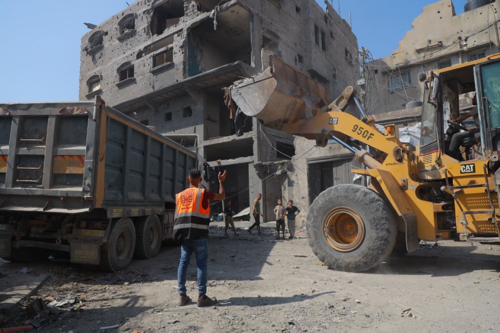 Thumbnail preview image for the video titled: Gaza Municipality crews begin clearing rubble from Israel's violent bombing of residential block