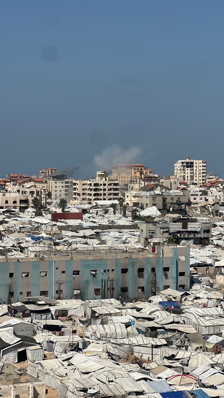 Thumbnail preview image for the video titled: Smoke rises following Israeli massacre of men in western Gaza City