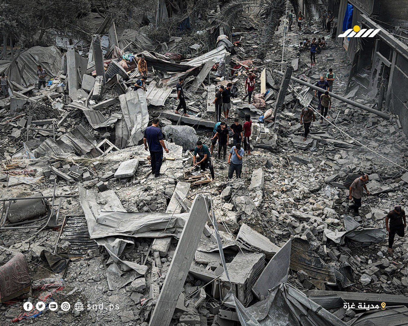 Thumbnail preview image for the video titled: Palestinians inspect what remains of their belongings after late night Israeli bombing of a house in central Gaza