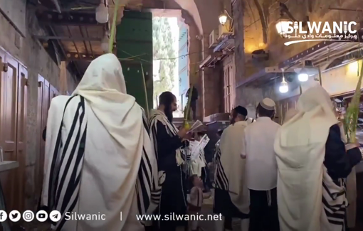 Thumbnail preview image for the video titled: Settlers perform Sukkot rites in front of the Al-Qattanin Gate of Al-Aqsa Mosque